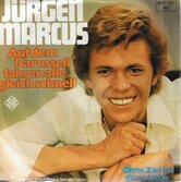JURGEN-MARCUS-AUF-DEM-KARUSSELL-FAHREN-ALLE....